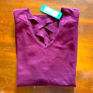 Burgundy sweater with crisscross detail